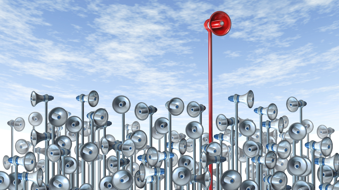 Image of red megaphone raising above all the rest.
